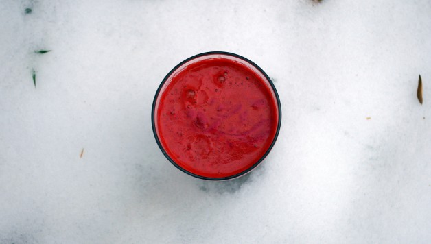 Carrot, beet, and apple juice in the snow
